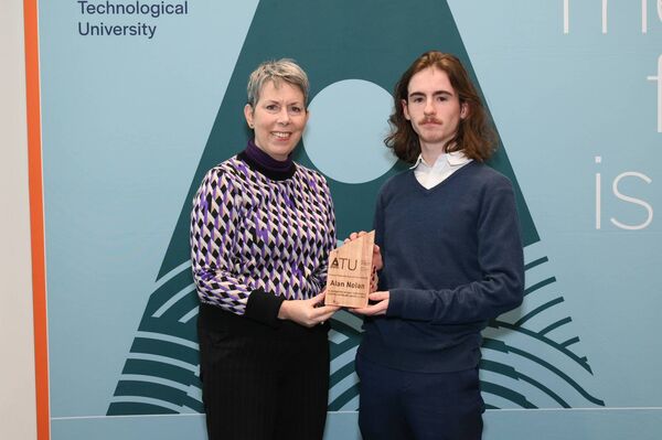 Alan Nolan from Castlebar receives his Entrance Scholarship for Product Design from Dr Orla Flynn, ATU President. Alan attended Davitt College and achieved over 550 points in his Leaving Cert.