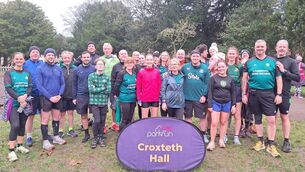 <p>Paula Donnellan Walsh, front centre, with the crew form the Liverpool Irish Rovers running club at the Croxeth Parkrun.</p>