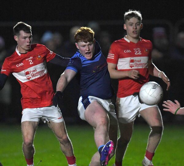 St Gerald’s attacker Joe Forry shoots for the posts despite the close attention of Cathair Tighe and Charlie Beale of St Muredach's. Picture: David Farrell