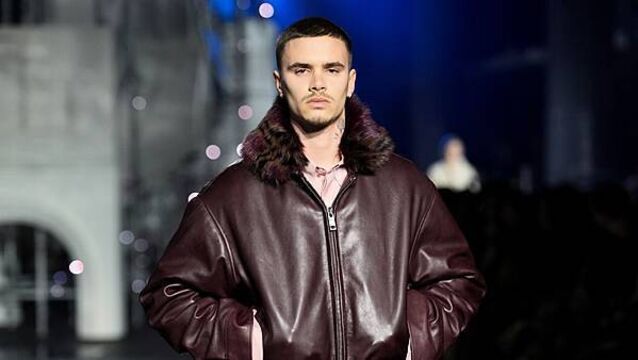 Romeo Beckham and Rosie Huntington-Whiteley on catwalk at London Fashion Week