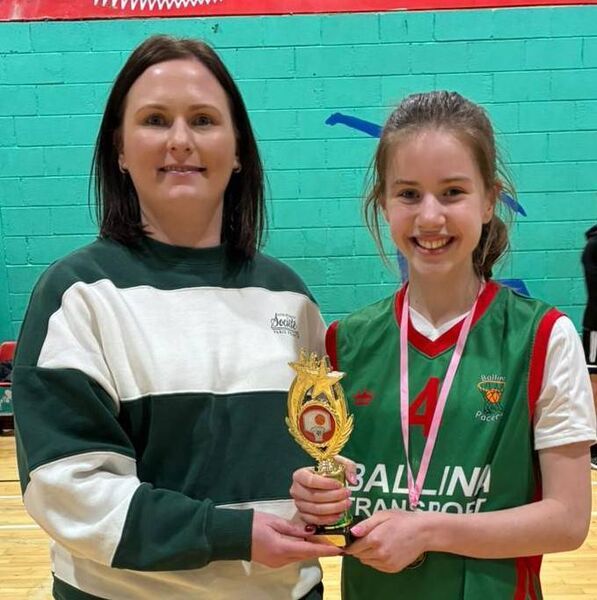 Hannah Gardiner, MVP winner, is presented with her trophy by Ciara O’Malley.