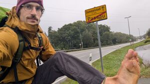 Eamonn returns home after epic barefoot walk