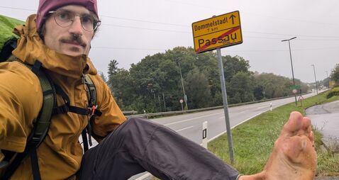 Eamonn returns home after epic barefoot walk