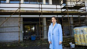 <p>Cllr Alma Gallagher outside the then unfinished primary care centre in Ballyhaunis during the local election campaign in 2025.</p>