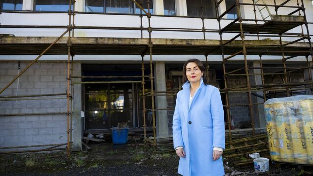 <p>Cllr Alma Gallagher outside the then unfinished primary care centre in Ballyhaunis during the local election campaign in 2025.</p>