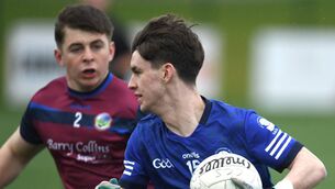<p>Balla’s Oran Murphy in action against Carrigaline’s Calum Gregson during the All-Ireland PPS Senior C football semi-final at Clarecastle this afternoon. Picture: David Farrell Photography </p>