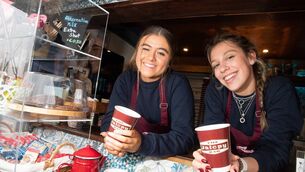 <p>Dirren Murphy and Carla Alcanez serving the coffee at the launch of the Jalopy Coffee Bar at Lough Lannagh.</p>