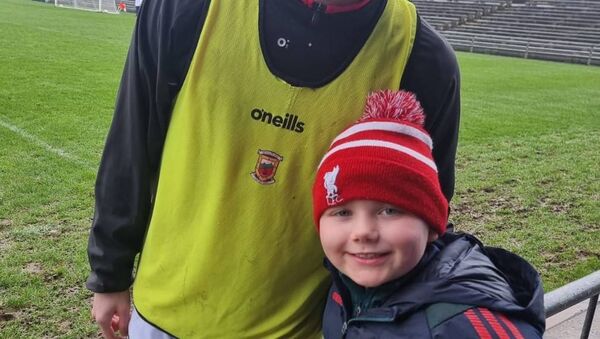 Theo Dunne (Ballina) with his football idol Mayo's Kobe McDonald in Castlebar after their win over Armagh on Sunday, March 1 last. 