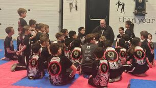 <p>Harry Thompson and some of the young students of Moy Valley Freestyle Martial Arts club.</p>