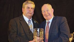 <p>Gerry Sweeney, Mayo League chairman, makes presentation to a Michael Ring, the Hall of Fame Inductee for 2025 at the Mayo Football League Annual Presentation Dinner and Awards Night in the Castlecourt Hotel Westport. Photo Michael Donnelly</p>