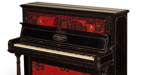 Piano John Lennon used to write Beatles songs fetches record amount at auction