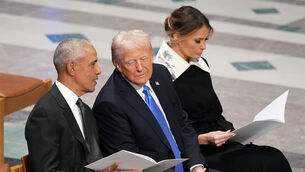 <p>Former US President Barack Obama talks with then President-elect Donald Trump as Melania Trump reads the funeral program before the state funeral for former President Jimmy Carter at Washington National Cathedral in Washington, January 9, 2025.	 Picture: AP Photo/Jacquelyn Martin</p>