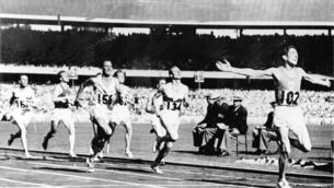 <p>Ronnie Delaney wins gold in the 1,500m race at the Olympic Games in Melbourne in 1956. Picture: NPHO/Allsport</p>