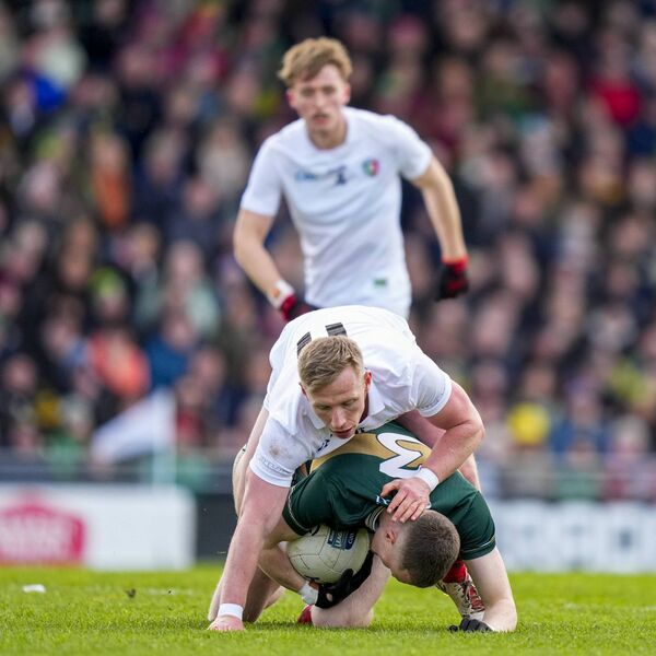Jason Foley of Kerry comes under pressure from Mayo's Ryan O'Donoghue. Jason Foley of Kerry comes under pressure from Mayo's Ryan O'Donoghue.