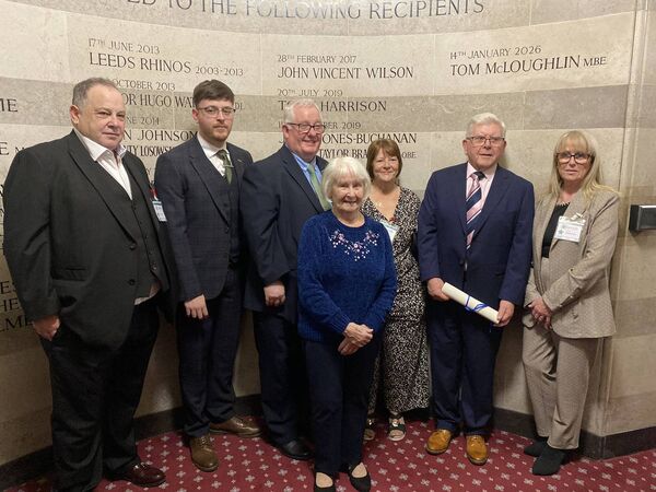 Tommy McLoughlin with staff from the Leeds Irish Centre at the awards ceremony. 