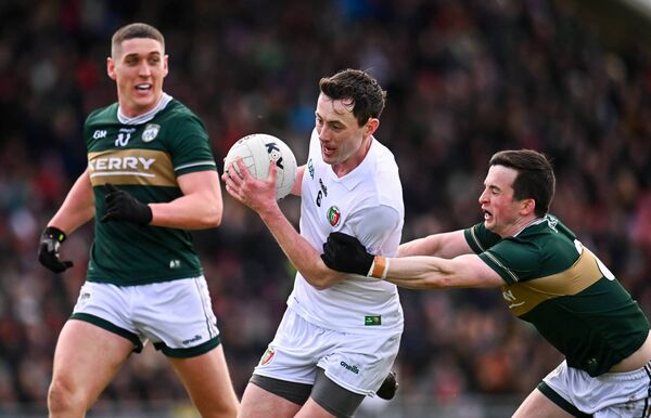 Mayo centre-back Diarmuid O'Connor is tackled by Paul Murphy of Kerry, as Joe O'Connor looks on. Mayo centre-back Diarmuid O'Connor is tackled by Paul Murphy of Kerry, as Joe O'Connor looks on.