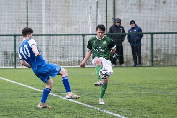 Manulla's Darragh Byrne, wearing 10, and Joe Gilmore of Claremorris. 