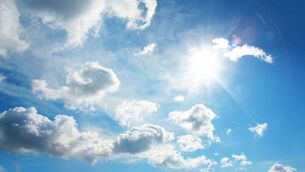 <p>cloudscape image of shinning sun over blue sky and clouds</p>