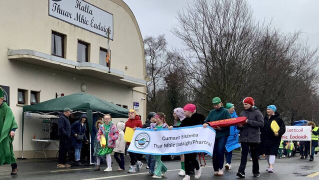 Local Notes: St Patrick leads the Thuar Mhic Eadaigh parade.