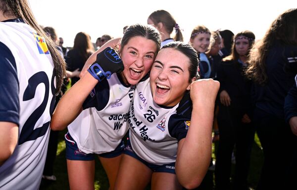 Emma Conway, left, and Ruby Brennan can't hide their joy after the victory of their Westport school.
