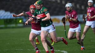 <p>Mayo's Joseph Burke in action against Westmeath's Darragh Smith in MacHale Park on Saturday afternoon.	Picture: David Farrell Photography</p>