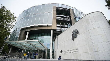 Man who helped set fire to apartment with children inside is jailed