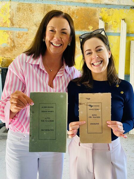 Acting principal of Errew National School Ciara Walsh and acting deputy principal Kate Tiernan with memorabilia from one of the the old national schools in Errew.