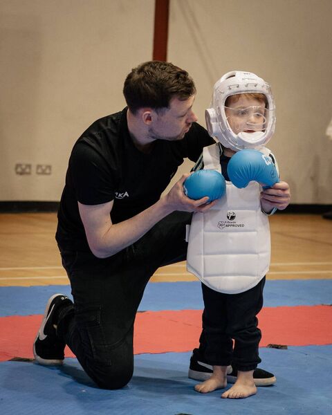 The youngest competitor of the day, 3-year-old Rían, learning the skills of Karate at his first ever Karate Competition with Mayo Karate Academy head coach Aaron McLoughlin. The youngest competitor of the day, 3-year-old Rían, learning the skills of Karate at his first ever Karate Competition with Mayo Karate Academy head coach Aaron McLoughlin.