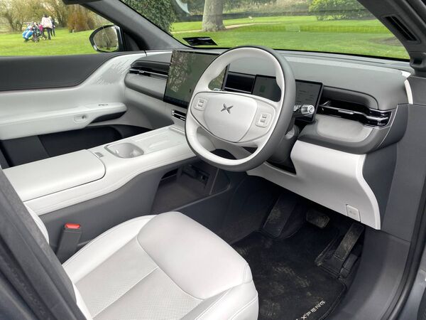 The spaciousness of the Xpeng's interior is enhanced by the winter-white faux leather upholstery.
