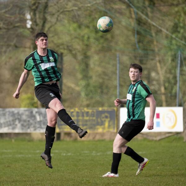 Ballyheane's Cillian Redmond clears the ball, with teammate Michael Fahy watching close by. Picture: John Corless