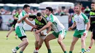 <p>Mayo's Cathal Carolan is tackled in Ruislip back in 2016, the last time that the team has travelled to play the Exiles in the opening round of the Connacht SFC.	Picture: INPHO/Gerry McManus</p>