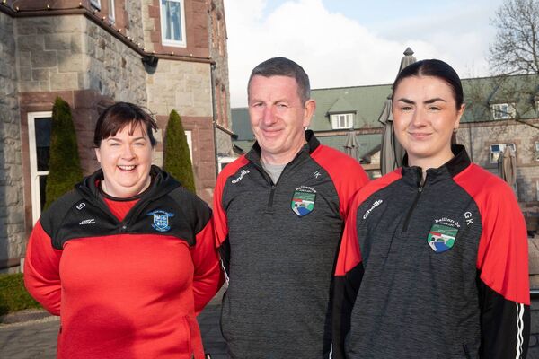 Elaine Duffy of Kiltimagh-Knock FC, left, with Greg Keleghan and Ava Keleghan from Ballinrobe Town.