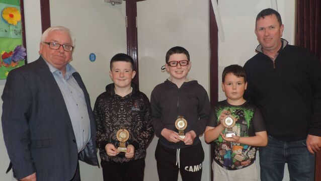 <p>At the Good Friday Quiz which was held in Kilmovee Community Centre were the National School winners. Pictured from left; Cllr John Caulfield, Eoghan Duffy, Darragh Egan, Kieran Sweeney and Gerrard Duffy. Cllr Caulfield acted as quiz master and Gerrard Duffy Quiz co-ordinator. Pic James Hunt Photography.</p>