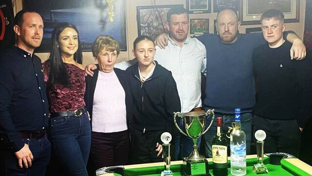 <p>Members of the Healy family with the winner and runner up William Doherty and Kian Gallagher in the recent John Healy Memorial Pool event.</p>
