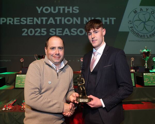 Aidan Dunleavy, Mayo Football League, presents Killala's Gavin Walsh with the U18 Division Two Player of the Month award for August. Aidan Dunleavy, Mayo Football League, presents Killala's Gavin Walsh with the U18 Division Two Player of the Month award for August.