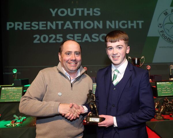 Aidan Dunleavy, Mayo Football League, presents Castlebar Celtic's Shay Gavin with the U18 Premier Division Player of the Month for August award. Aidan Dunleavy, Mayo Football League, presents Castlebar Celtic's Shay Gavin with the U18 Premier Division Player of the Month for August award.