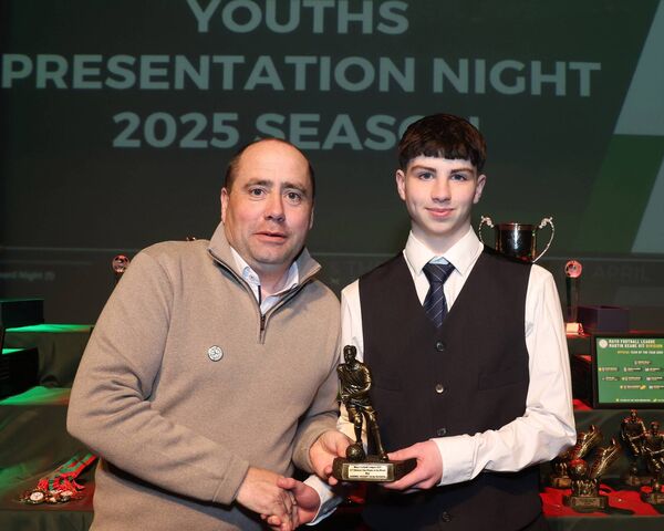 Aidan Dunleavy, Mayo Football League, presents Iorras Aontaithe's Gabriel Hugget with the U17 Division One Player of the Month award for May. Aidan Dunleavy, Mayo Football League, presents Iorras Aontaithe's Gabriel Hugget with the U17 Division One Player of the Month award for May.