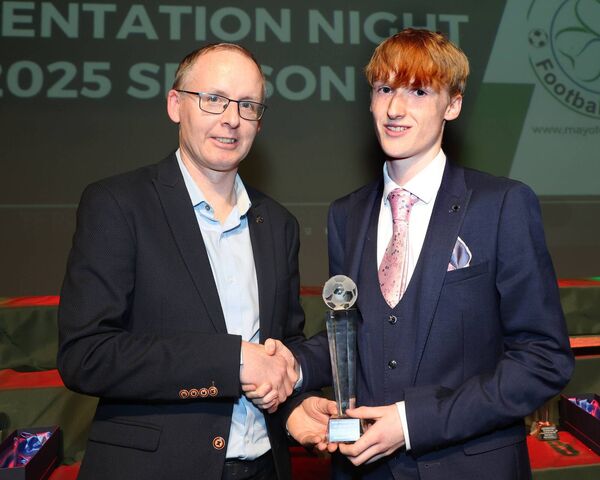 Kieran Gallagher, Mayo Football League, presents the U17 Division Three Player of the Year Award to Ballyhaunis Town's Finn Morton. Kieran Gallagher, Mayo Football League, presents the U17 Division Three Player of the Year Award to Ballyhaunis Town's Finn Morton.