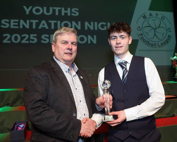 Gerry Sweeney, Mayo Football League chairman, presents Sean Casey of Westport United with the U18 Footballer of the year award at the Youth Awards night in the TF Royal Hotel and Theatre, Castlebar. Picture: Michael Donnelly Gerry Sweeney, Mayo Football League chairman, presents Sean Casey of Westport United with the U18 Footballer of the year award at the Youth Awards night in the TF Royal Hotel and Theatre, Castlebar. Picture: Michael Donnelly