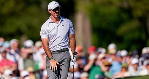 Rory McIlroy’s third round splutters into life after vow to keep his foot on gas