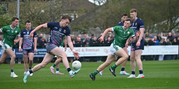 Hugh O'Loughlin from Kilmaine tears forward for Mayo watched closely by London corner-back Sean O'Donoghue. It was O'Loughlin's senior championship debut.	Picture: Sheila Fernandes