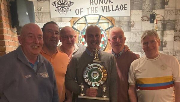 The victorious Curry 1 team who won the 2026 Honour of the Village Darts competition hosted by Walsh’s Public House, Main Street, Charlestown recently in what was an all Curry final.