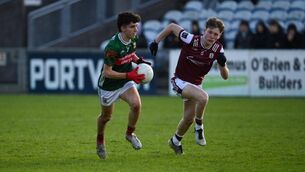<p>Mayo’s Alexander Smyth bypasses Galway’s Oliver O’Sullivan on his way to scoring a point during the Electric Ireland Connacht MFC tie between Mayo and Galway at Hastings Insurance MacHale Park this evening. Picture: David Farrell</p>