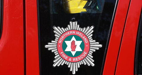 Dozens of firefighters tackle blaze at derelict building in Co Antrim