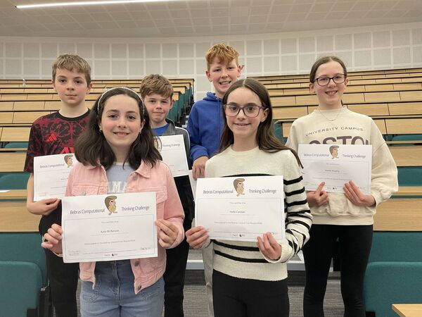 Marco McDonagh, Kate McKenzie, Dylan Hannick, Donnacha Gavin, Holly Carolan and Niamh Murphy at the Bebras National Finals in Maynooth University. 
