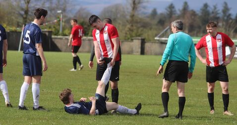 Local Notes: Sportsmanship at its best between Ballyglass FC and Glenhest players.