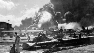 <p>An explosion at the Naval Air Station, Ford Island, Pearl Harbour during the Japanese attack in World War II. 	Picture: Fox Photos/Getty Images</p>