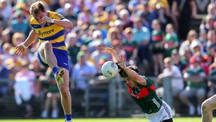 <p>Roscommon's Enda Smith has a goal attempt blocked by Enda Hession.	Picture: INPHO/Tom O’Hanlon</p>