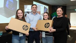 <p>Edel and Orlaith accompanied by Teen-Turn Lead Mentor Stephanie Hogan being awarded their prizes by Donal Harford From AMD.</p>