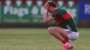 <p>Mayo's Kobe McDonald is alone with his thoughts after the final whistle in Tuam Stadium last Wednesday.	Picture: INPHO/Tom O’Hanlon</p>